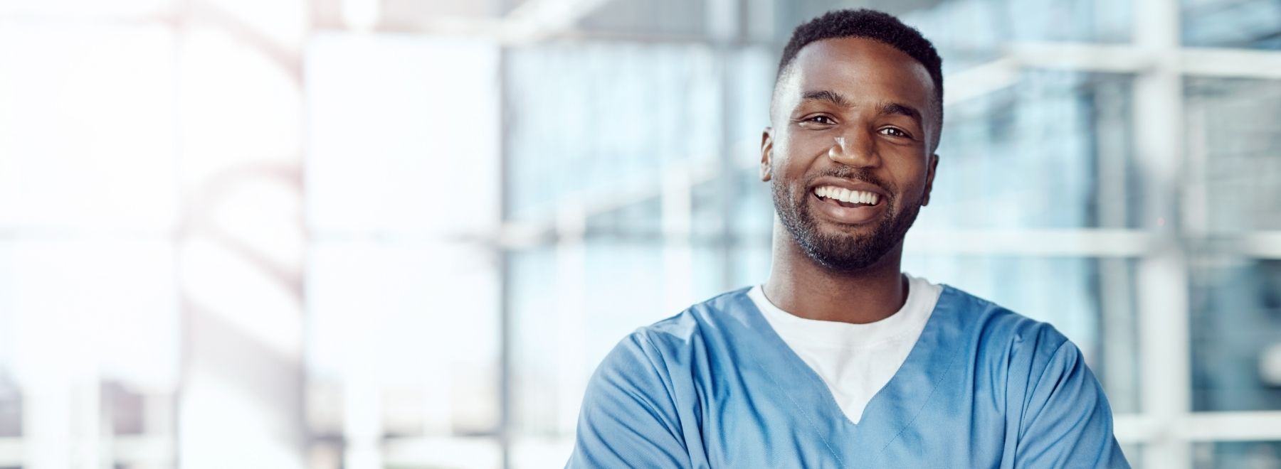 A smiling male nurse